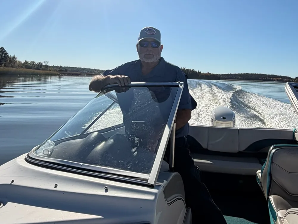 Russ Thorpe at the helm of his boat